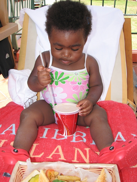 Antigua_Vacation_119.JPG - The concentration is intense as Mikayla attempts to straw her own cup for the very first time....