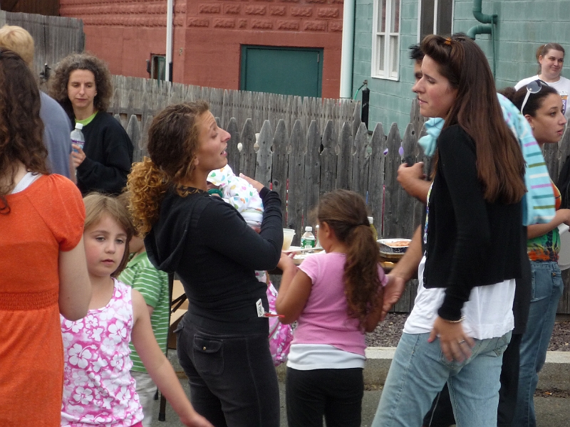 Family_Fun_Day_044.JPG - Desiree with one of the twins.   You can just make out the receptionist Nicky (far right) below the head of Tammy.