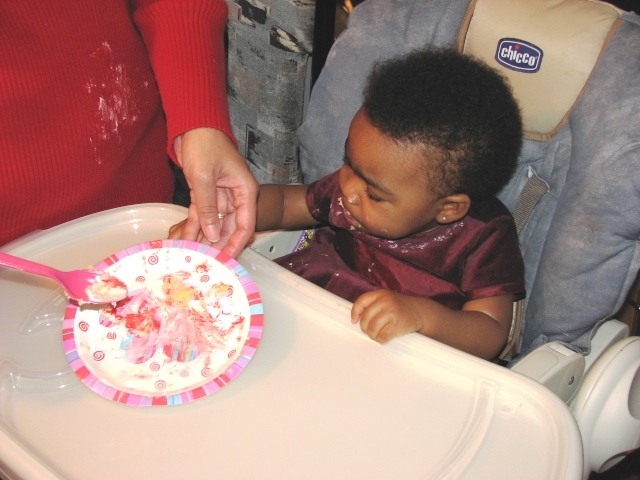 1st_bday_valentine_011.JPG - Mikayla's first cake experience.  The sugar rush didn't end until waaaay after her bedtime.