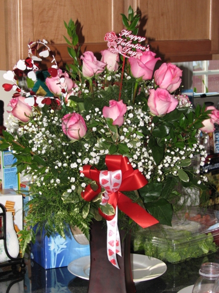 1st_bday_valentine_018.JPG - The James clan couldn't make it down from Canada and Antigua, but they sent these beautiful flowers from a local flowershop instead.  Thanks Mom, Dad, Marcia and Lois!!
