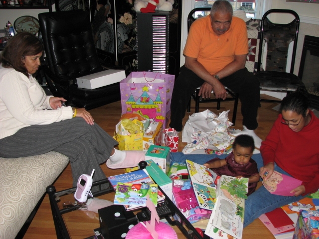1st_bday_valentine_022.JPG - Grandaddy and Nanna look on as the mayhem begins