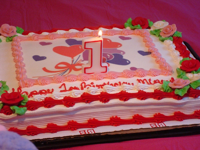 Bday-Valentine_0019.jpg - Birthday cake for the Birthday Girl.  Yummy-tasting too!  She had a little help blowing out the candle, of course.