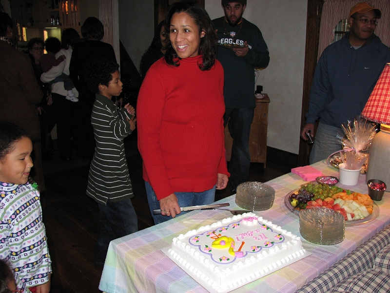 Baby_Shower_084.JPG - Cake girl about to cut the...well...cake!  :-)
