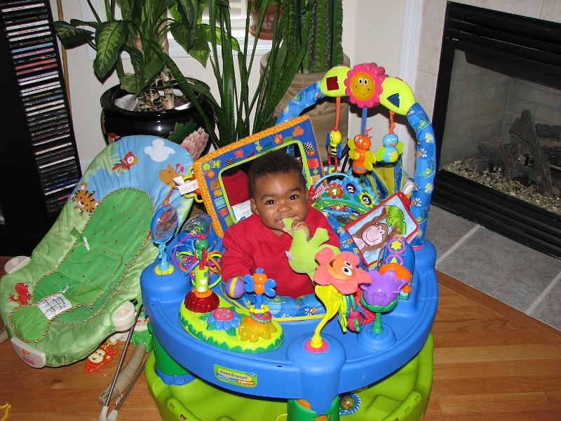 Halloween_Swim_093.JPG - Chewing on froggy with her new teeth (two on top, two on bottom)