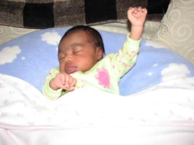 More_Mikayla_206.JPG - She likes to pose in her sleep.  This one I dub the "Power to the People!" Pose