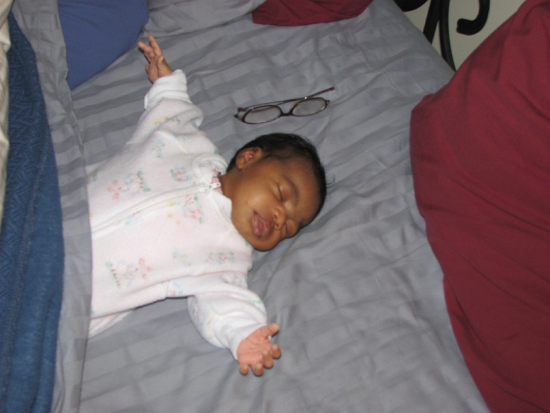 More_Mikayla_229.JPG - We had Mikayla sleeping with us in bed for a short time, but as you can see, she's apt to take up too much space.