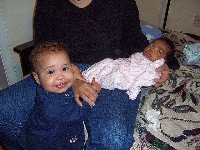 More_Mikayla_267a.jpg - Kyra seems to love babies too. Just a note that she was very helpful in "pointing out" all the things we need to do to baby-proof our home