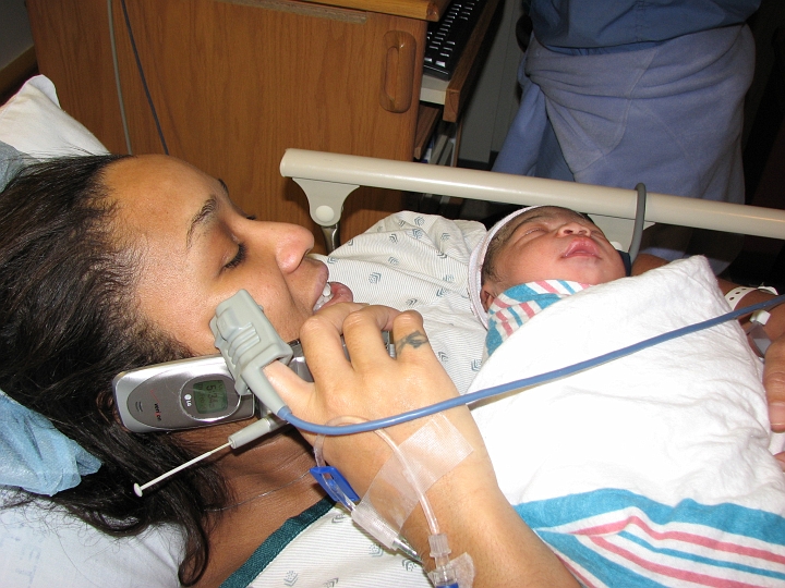 Mikayla_s_Birth_029.jpg - Kim on the phone giving the family the good news!!