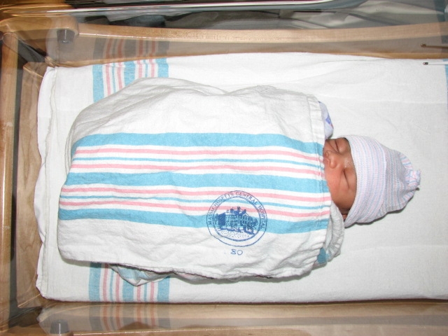 Mikayla_s_Birth_099.jpg - Mikayla taking a well-deserved nap in preparation for the rest of her exciting life!   We love you!