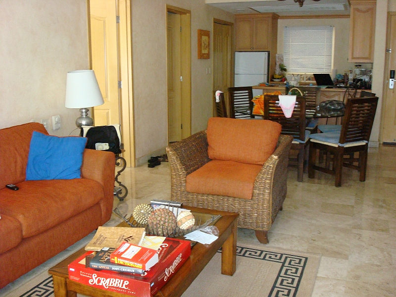 Puerto_Vallarta_080a.jpg - Just a photo of the main living area.  2 bedrooms, 3 full bathrooms, full kitchen, half kitchen, dining and living rooms, travertine tile throughout, two balconies, in-suite laundry and daily maid service. All the comforts of home :-)