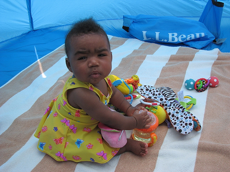 Puerto_Vallarta_089.JPG - We also researched beach cabanas, and came up with one from LL Bean.  Easy to setup and lots of shade and breeze for Mikayla