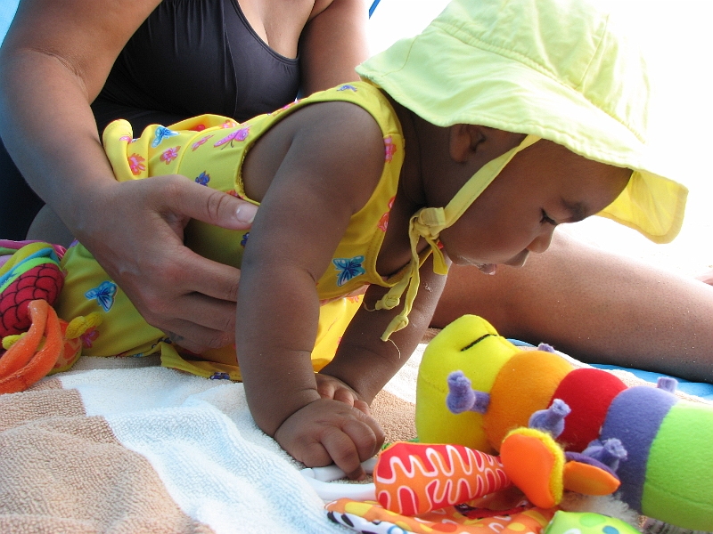 Puerto_Vallarta_119.JPG - Mikayla debating whether to drool on her toy, or eat it.
